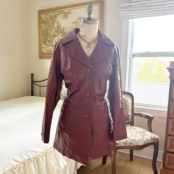 Red leather jacket70s maroon leather longline jacket fits like a medium